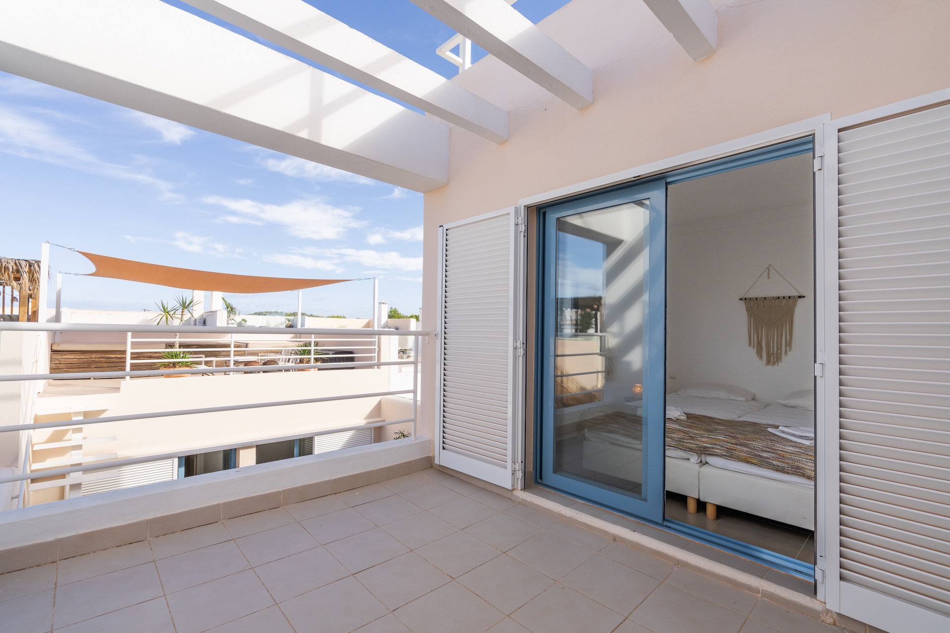 Resa Estates Ibiza sale ted koop Cala Tarida patio townhouse upper room.JPG